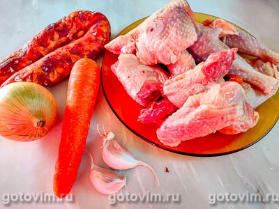 Канжа - португальский куриный суп с рисом и колбасой чоризо Канжа - португальский куриный суп с рисом и колбасой чоризо