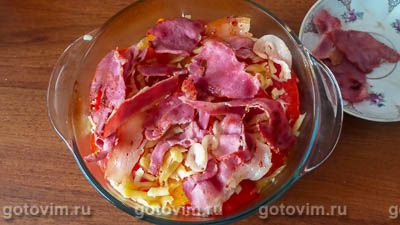 Тыква, запеченная в духовке кусочками с помидорами, беконом и вином Тыква, запеченная в духовке кусочками с помидорами, беконом и вином